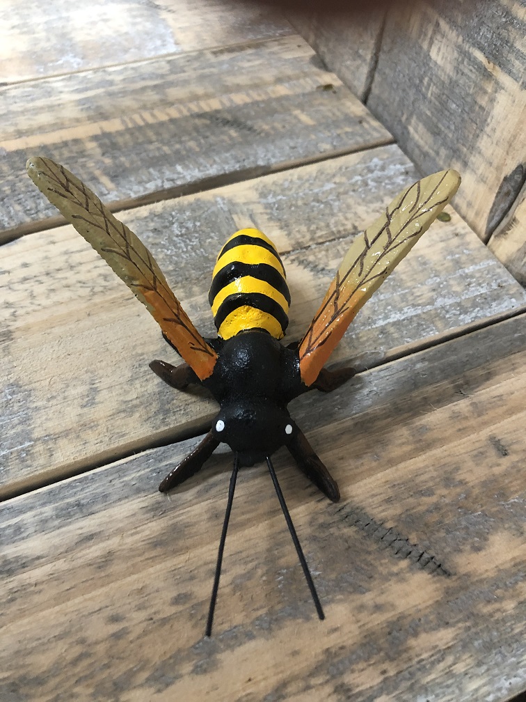 Beautiful coloured cast iron bee