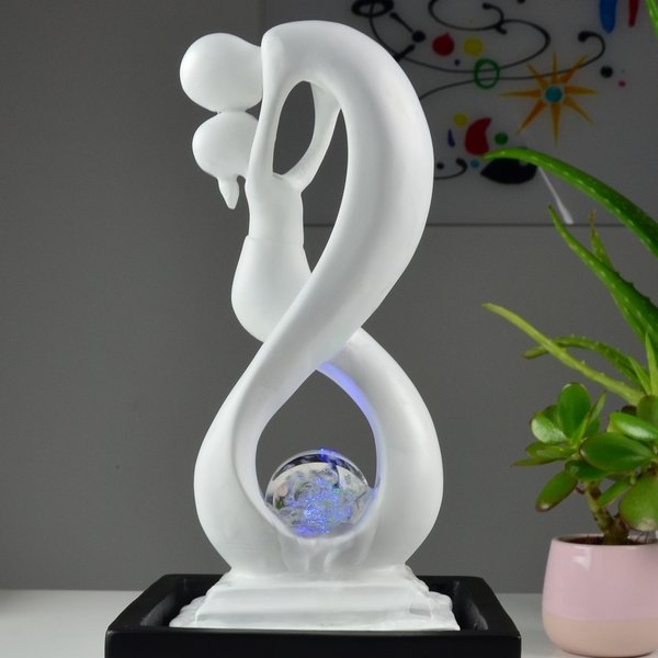Indoor fountain, abstract sculpture with water ornament