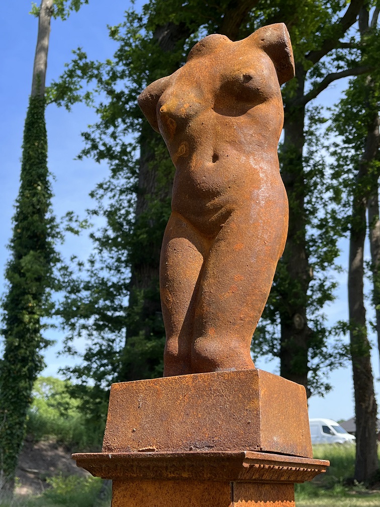 Female torso on pedestal - entirely cast iron