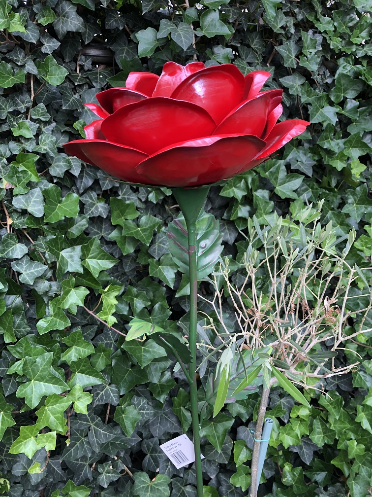 A work of art, this large rose made entirely of metal.