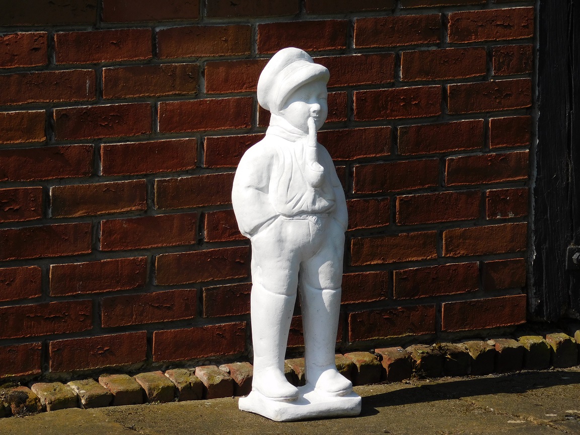 Statue boy with pipe - solid stone