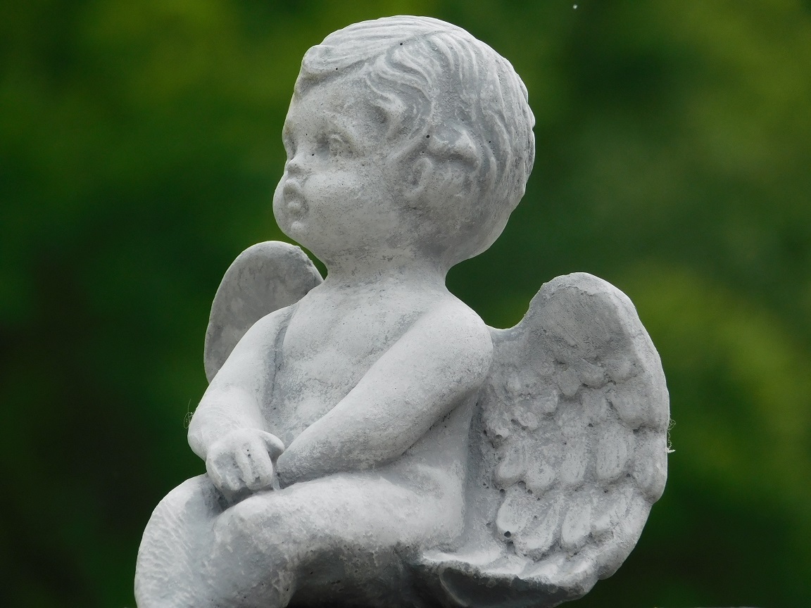 Angel - sitting - full made of stone