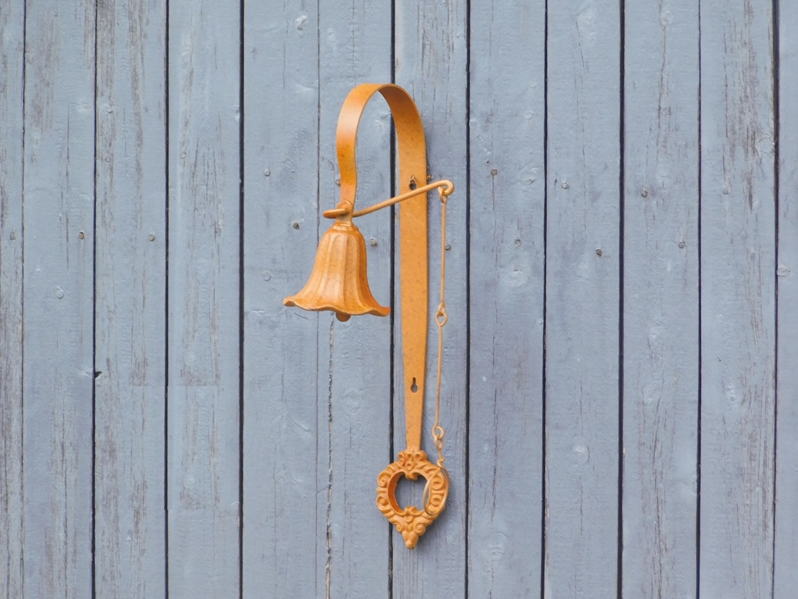 Cast iron wall bell - with wreath - rust colour - retro design