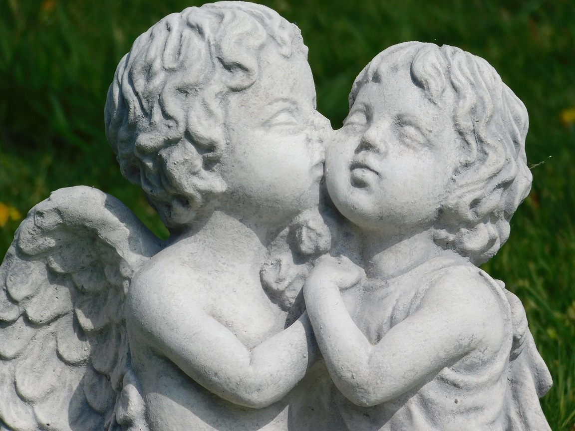Statue of Kissing Angels - solid stone