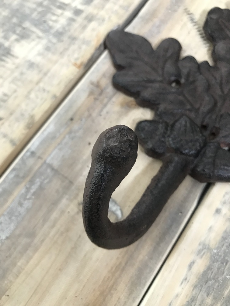 Coat hook with oak leaf, coat rack in cast iron, antique, brown 