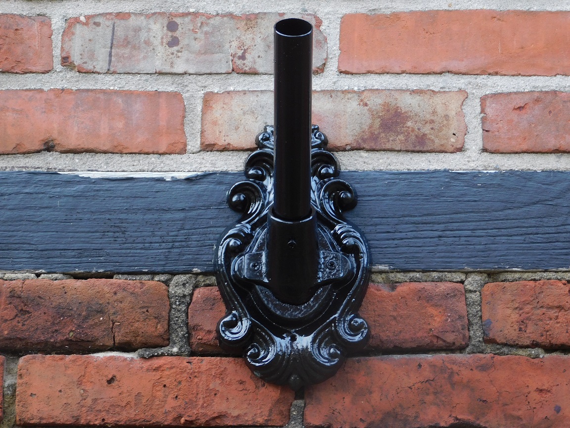 Decorative flagpole holder - cast iron - black