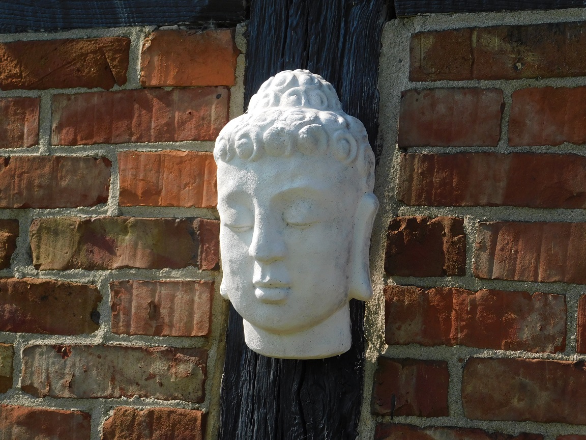 Wall ornament Buddha - solid stone