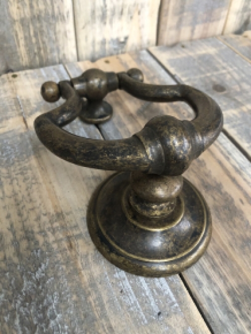 Door knocker, stylish and antique dark brass.