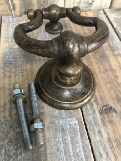 Door knocker, stylish and antique dark brass.