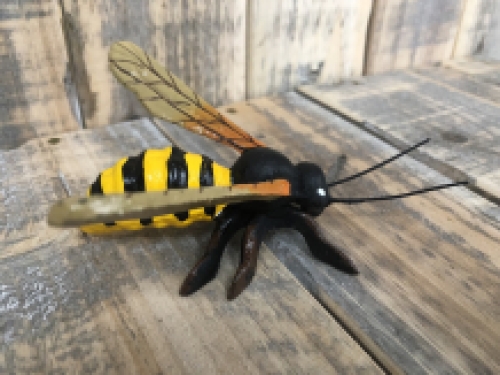 Beautiful coloured cast iron bee