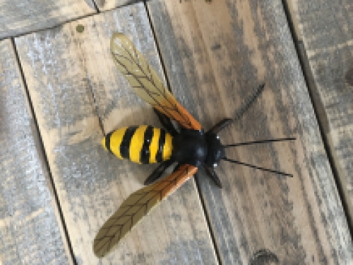 Beautiful coloured cast iron bee