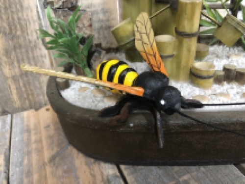 Beautiful coloured cast iron bee