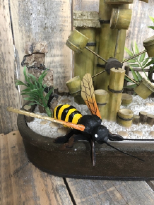 Beautiful coloured cast iron bee