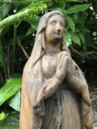 Statue of Mary full of stone, beautiful in detail, oxide color