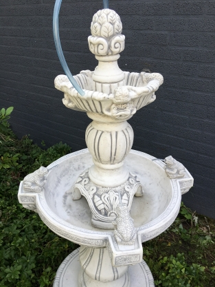 Garden fountain with spitting frogs - full stone