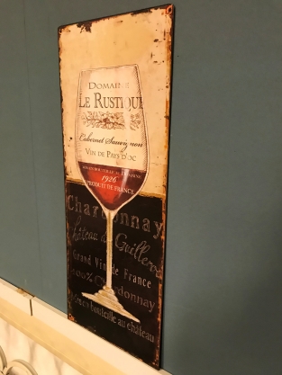 1 x Metal design sign with a beautifully painted wine glass and text influences.