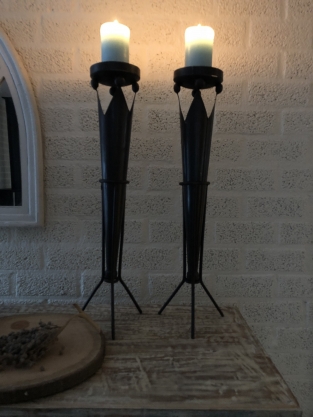 Set of beautiful standing metal castle torches with crown