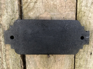 Cast iron sign ''Toilet'' in front of door