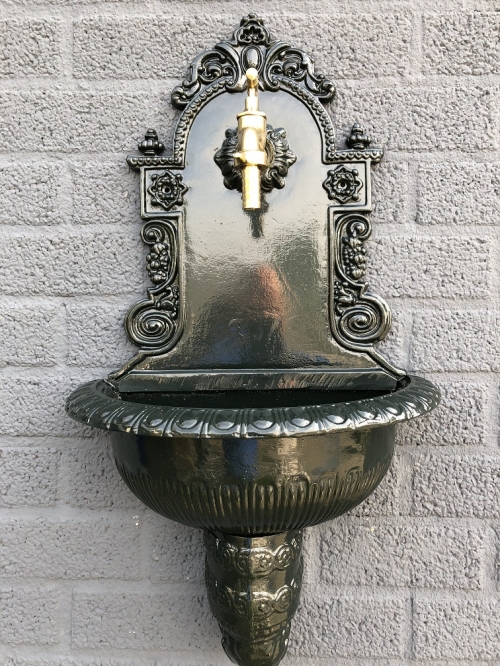 Top quality wall fountain, sink heavy aluminum dark green with brass faucet.