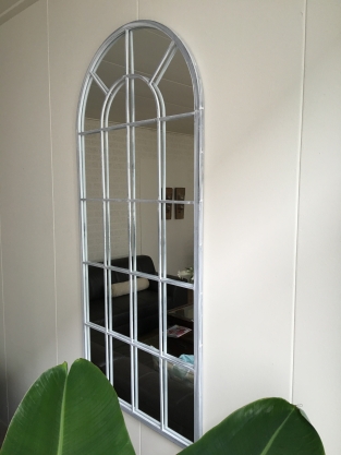 Large hefty mirror with metal frame, very nice in shape.