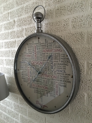 Large sturdy design-trendy metal wall clock.