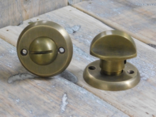 Toilet door hardware, twist lock, brass patinated