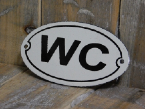 Logo/Schild der Toilette emailliert