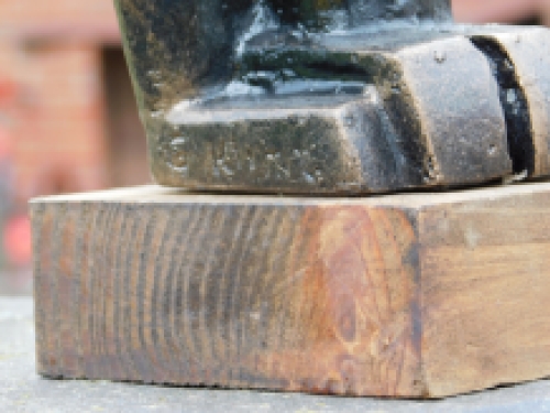 Eagle on wooden base - antique iron