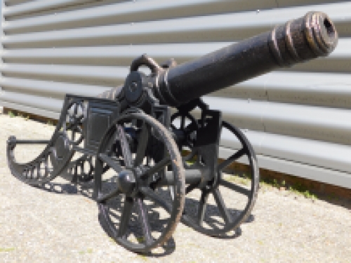 Beautiful hefty decorative cannon, cast iron black.