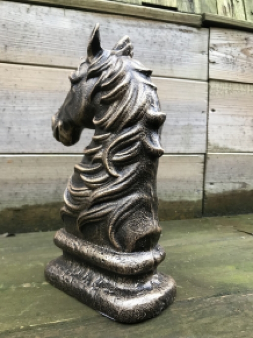 Beautiful statue of a horse, bronze look, made of cast iron