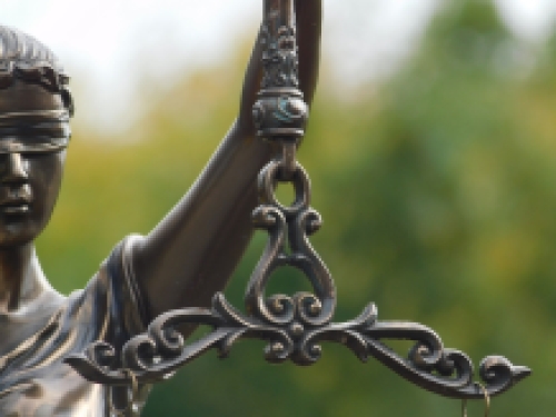 A large statue of Lady Justice, bronze-look, very beautiful!