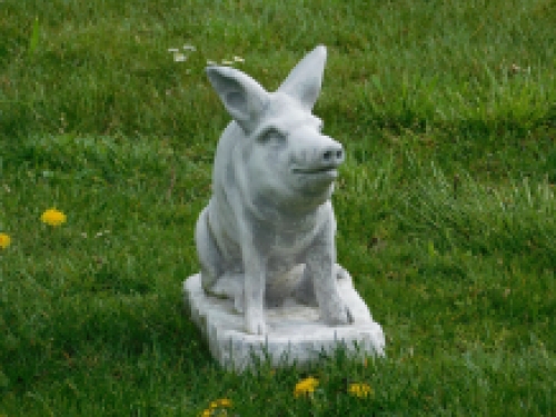 Statue of a pig - solid stone