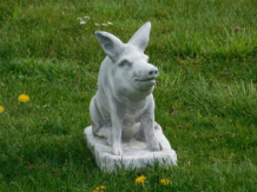 Statue of a pig - solid stone