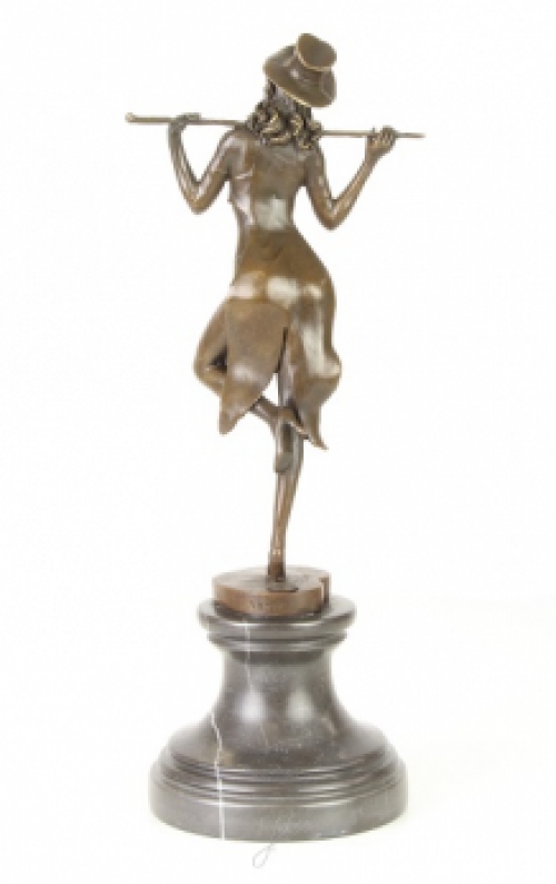 A bronze statue/sculpture of a theater dancer