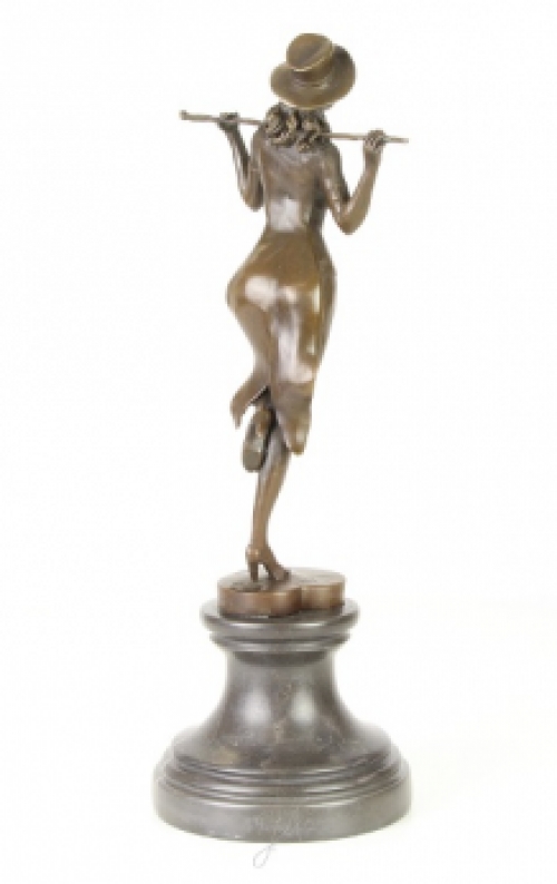 A bronze statue/sculpture of a theater dancer