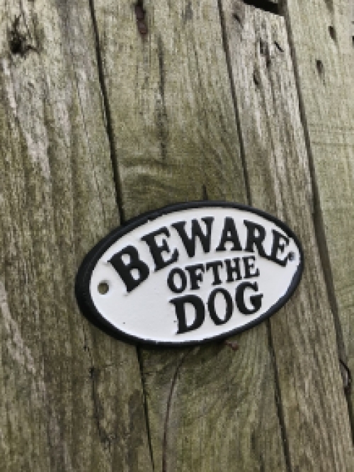 A cast iron sign with the text: ''BEWARE OF THE DOG'', nice bold letters!