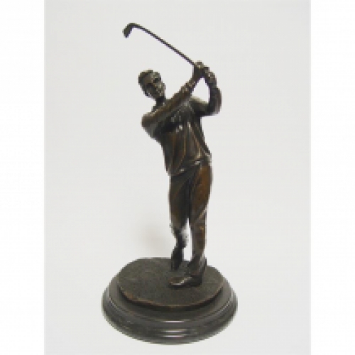 A bronze statue/sculpture of a golfer