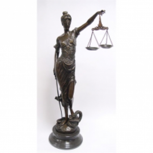 A bronze statue/sculpture of a gigantic Lady Justice