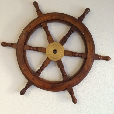 Solid wooden boat steering wheel with copper hub