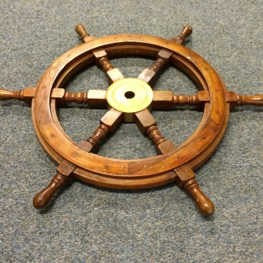 Solid wooden boat steering wheel with copper hub