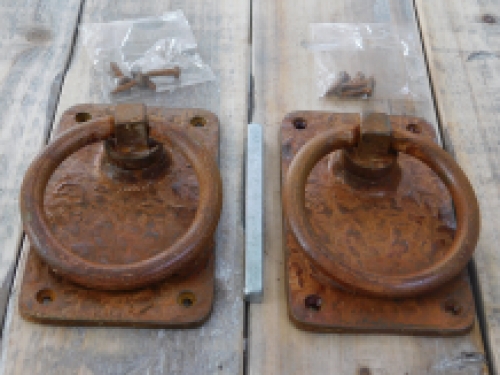 Rustic large rust colored rings as a door shutter/gate shutter set, beautifully nostalgic.