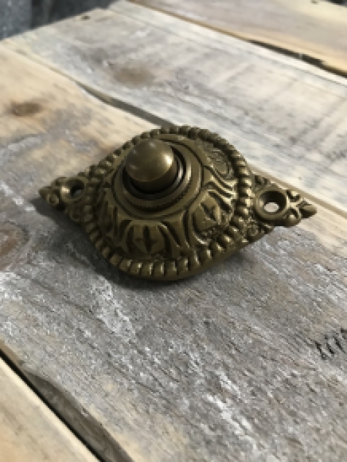 Ornate doorbell - patinated brass