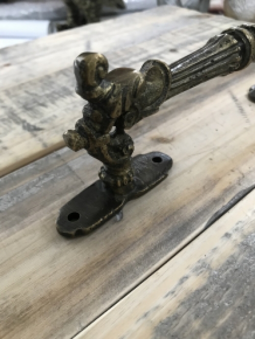 Door handle, cabinet handle, founder time, made of iron, brass patinated