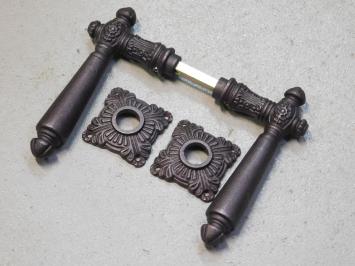 Set of door handles - including rosettes - iron - red/brown rusted