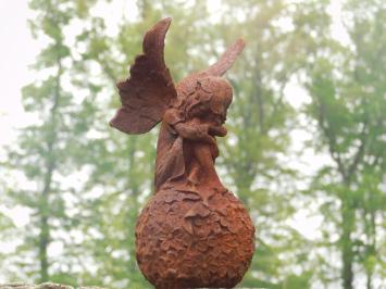 Angel on globe - cast iron