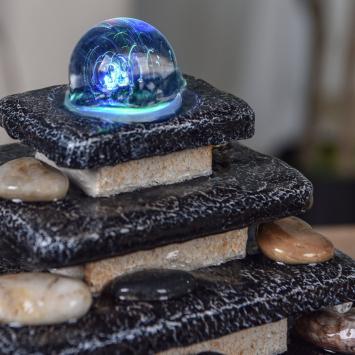 Fountain ''Zen'' inside, soothing waterfall, temple with rocks