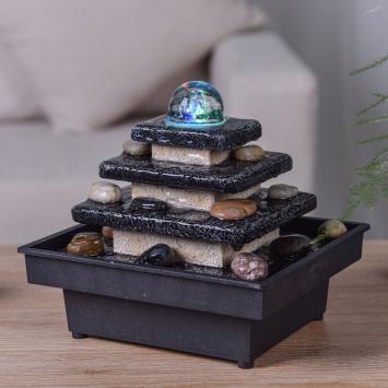 Fountain ''Zen'' inside, soothing waterfall, temple with rocks