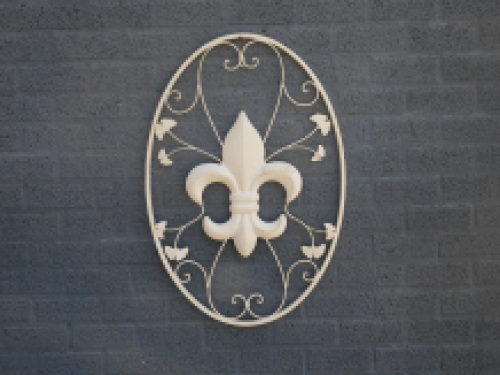 A large wrought iron wall ornament, the French Lily, antique-white