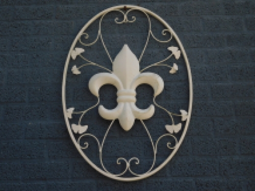 A large wrought iron wall ornament, the French Lily, antique-white