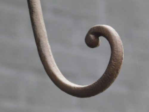 Cast iron hook with bird, brown, very beautiful to behold